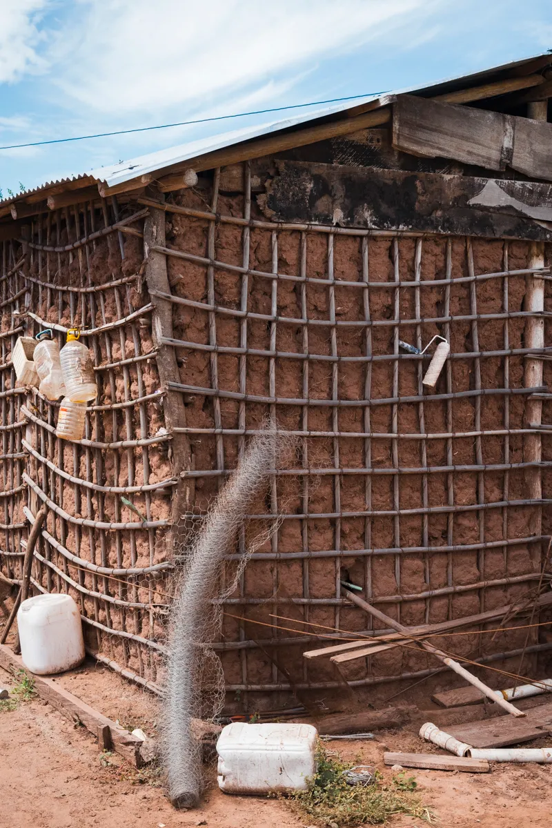 The mud-and-lattice wall of a house under construction